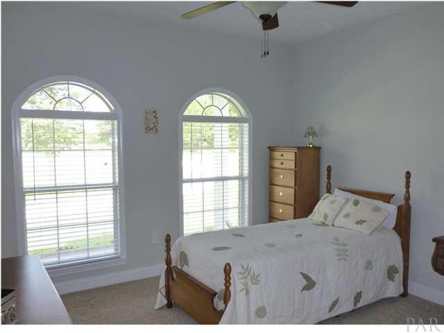 590 Ard Field Road Jay, FL 32565 - Photo 8 of 16 Additional Bedroom with Fan and lots of light