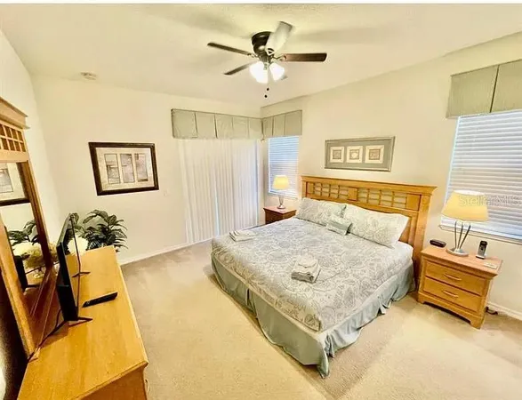 a view of a swimming pool with a lounge chair