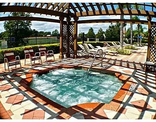 a kitchen with a table and chairs in it