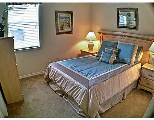 a couple of chairs sitting in front of a door