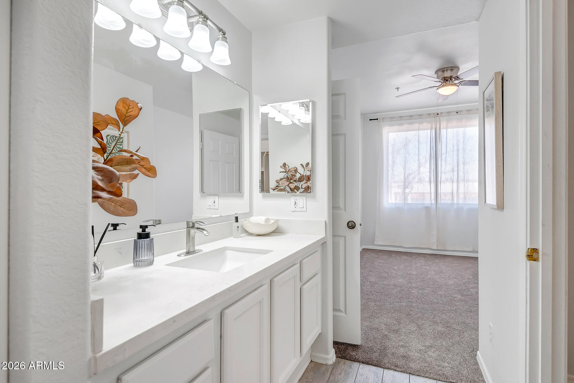 1445 East Broadway Road, Unit 208 Tempe, AZ 85282 - Photo 18 of 29 a bathroom with a sink vanity and a mirror