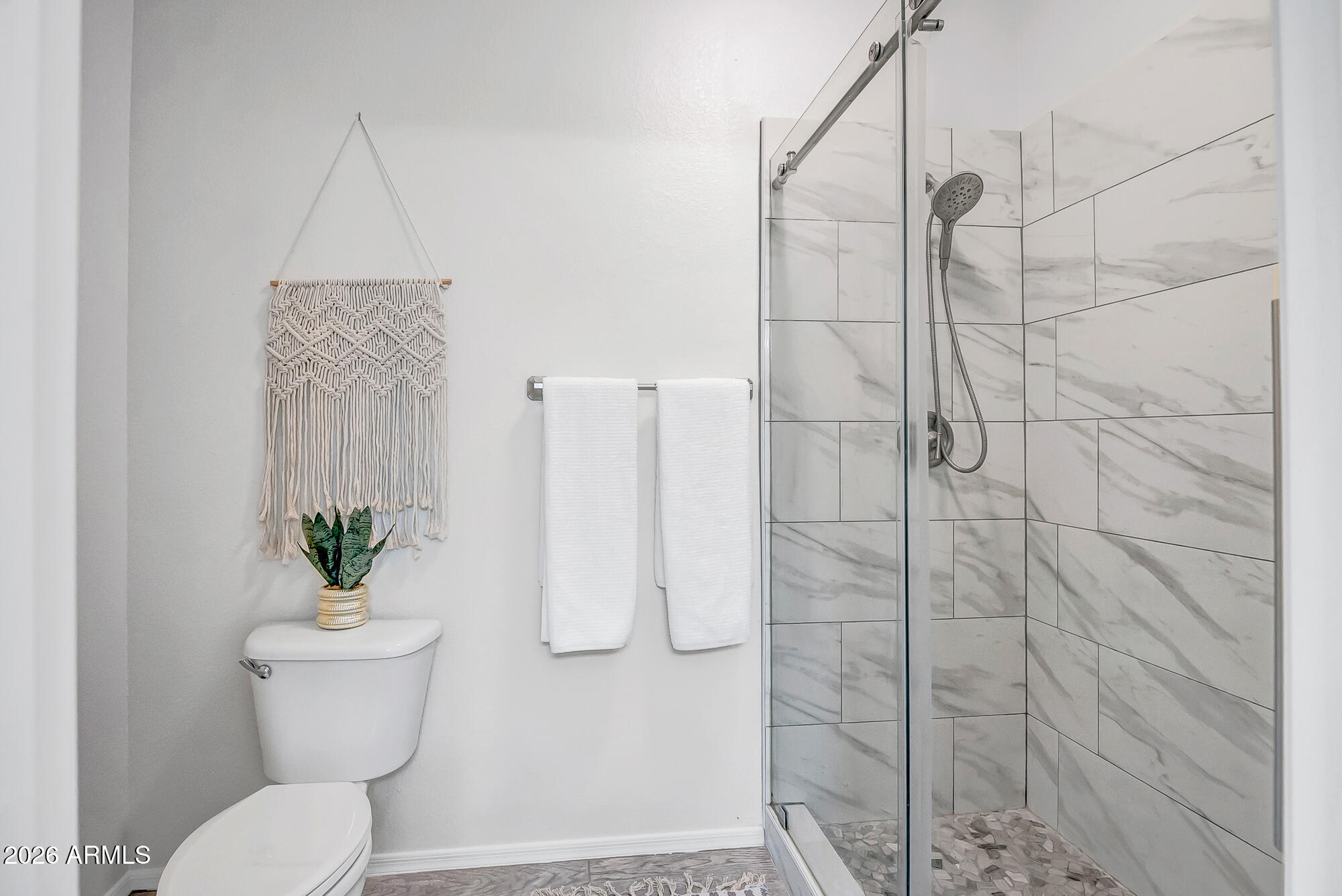 1445 East Broadway Road, Unit 208 Tempe, AZ 85282 - Photo 19 of 29 a bathroom with a toilet and a shower