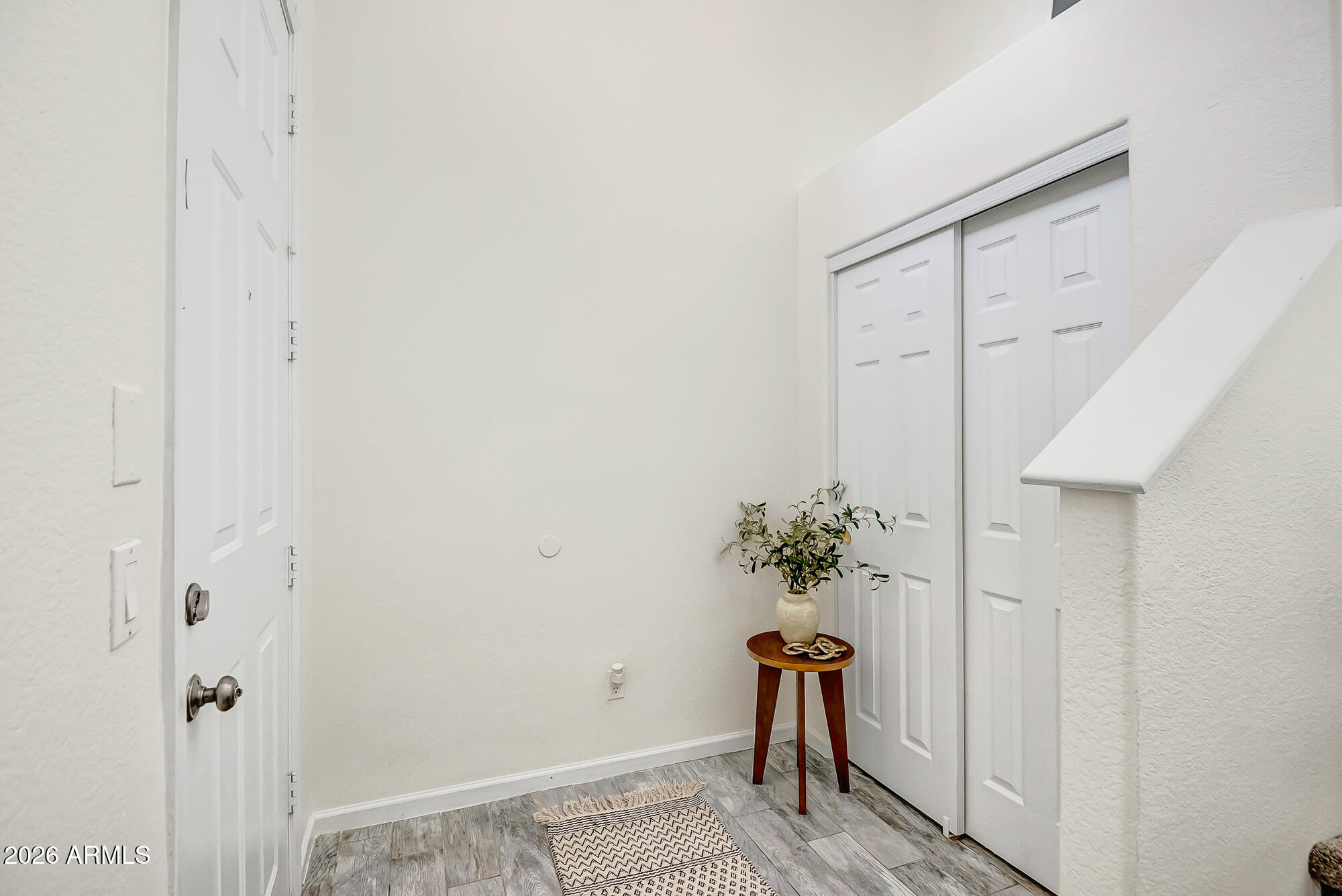 1445 East Broadway Road, Unit 208 Tempe, AZ 85282 - Photo 9 of 29 a view of hallway with table and a potted plant