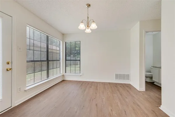 a view of livingroom with hardwood floor and window