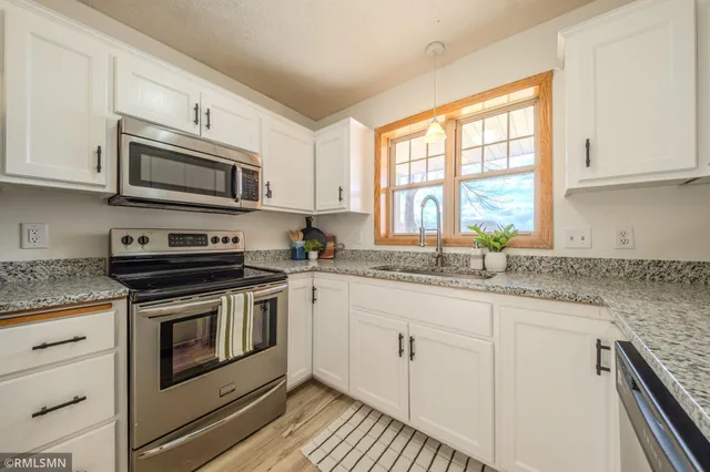 $305,000 | 1002 Pleasant View Court Northwest, Isanti, MN 55040