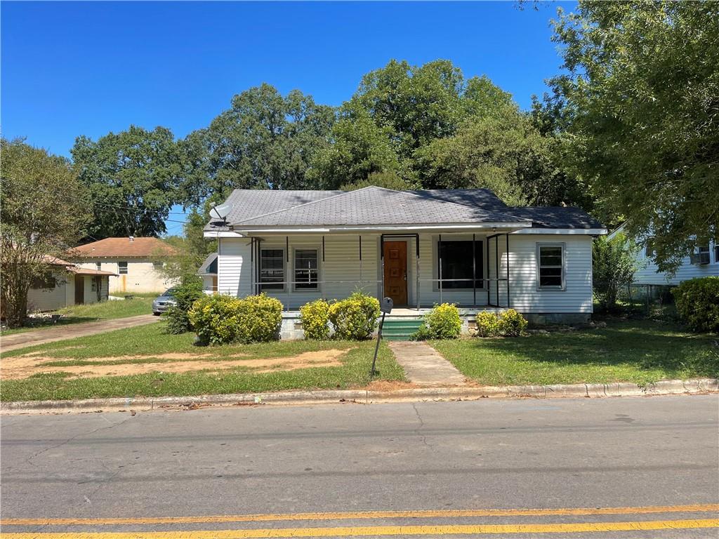 417 East 20th Street Southwest Rome, GA 30161 - Photo 1 of 1 a front view of a house with a yard