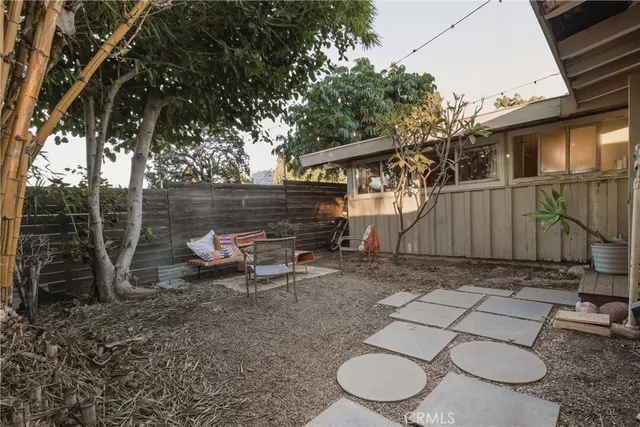 a backyard of a house with seating space