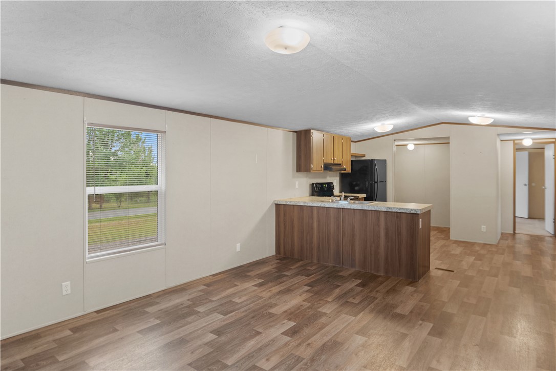 1188 Old Liberty Road Easley, SC 29640 - Photo 10 of 28 This inviting space combines kitchen convenience with a welcoming dining area.