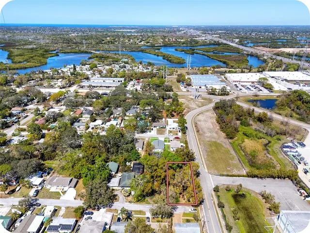 an aerial view of residential building with parking space