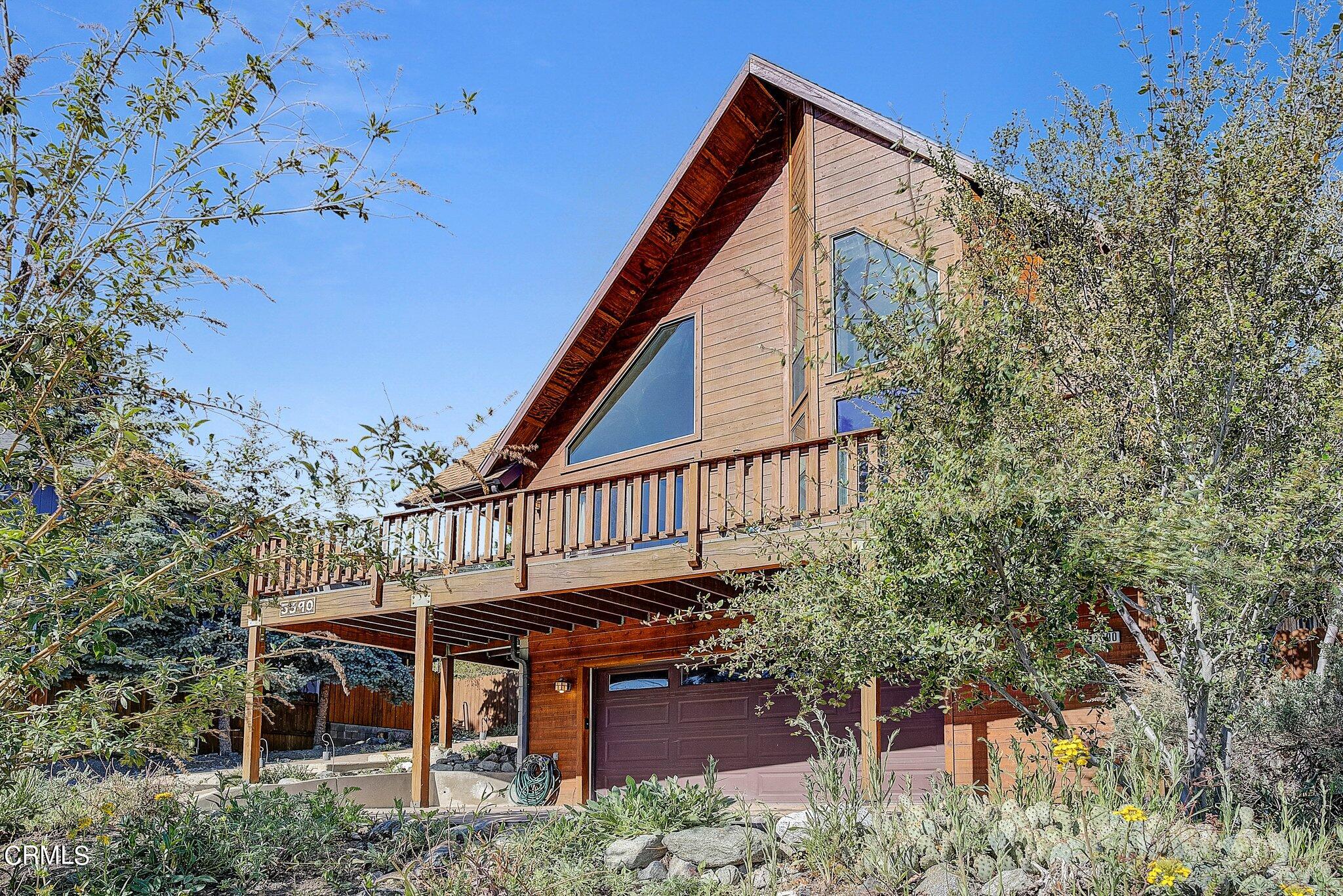 5390 Locarno Drive Wrightwood, CA 92397 - Photo 33 of 33 front view of a house with a small yard