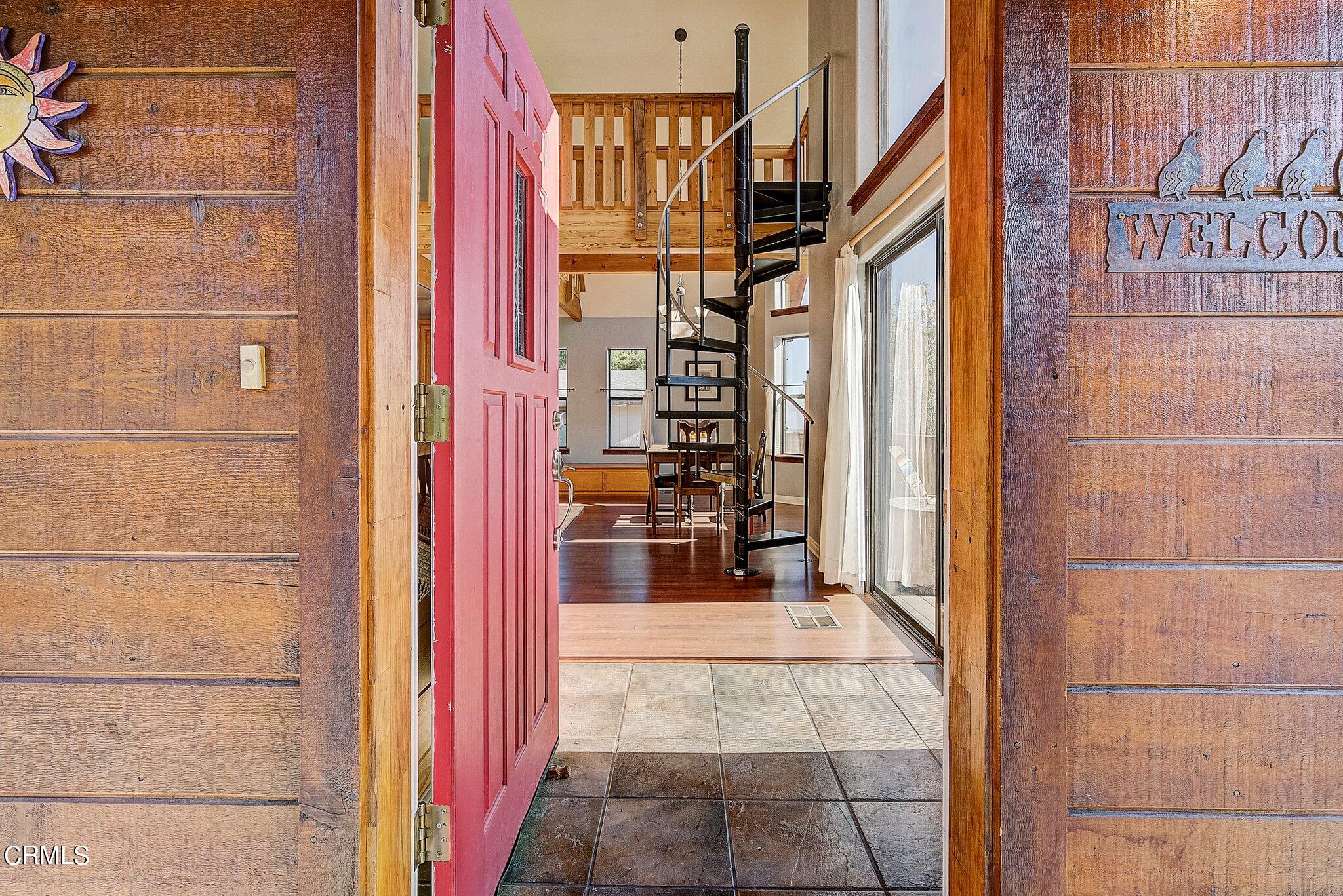 5390 Locarno Drive Wrightwood, CA 92397 - Photo 4 of 33 a view of a balcony a refrigerator and bathroom