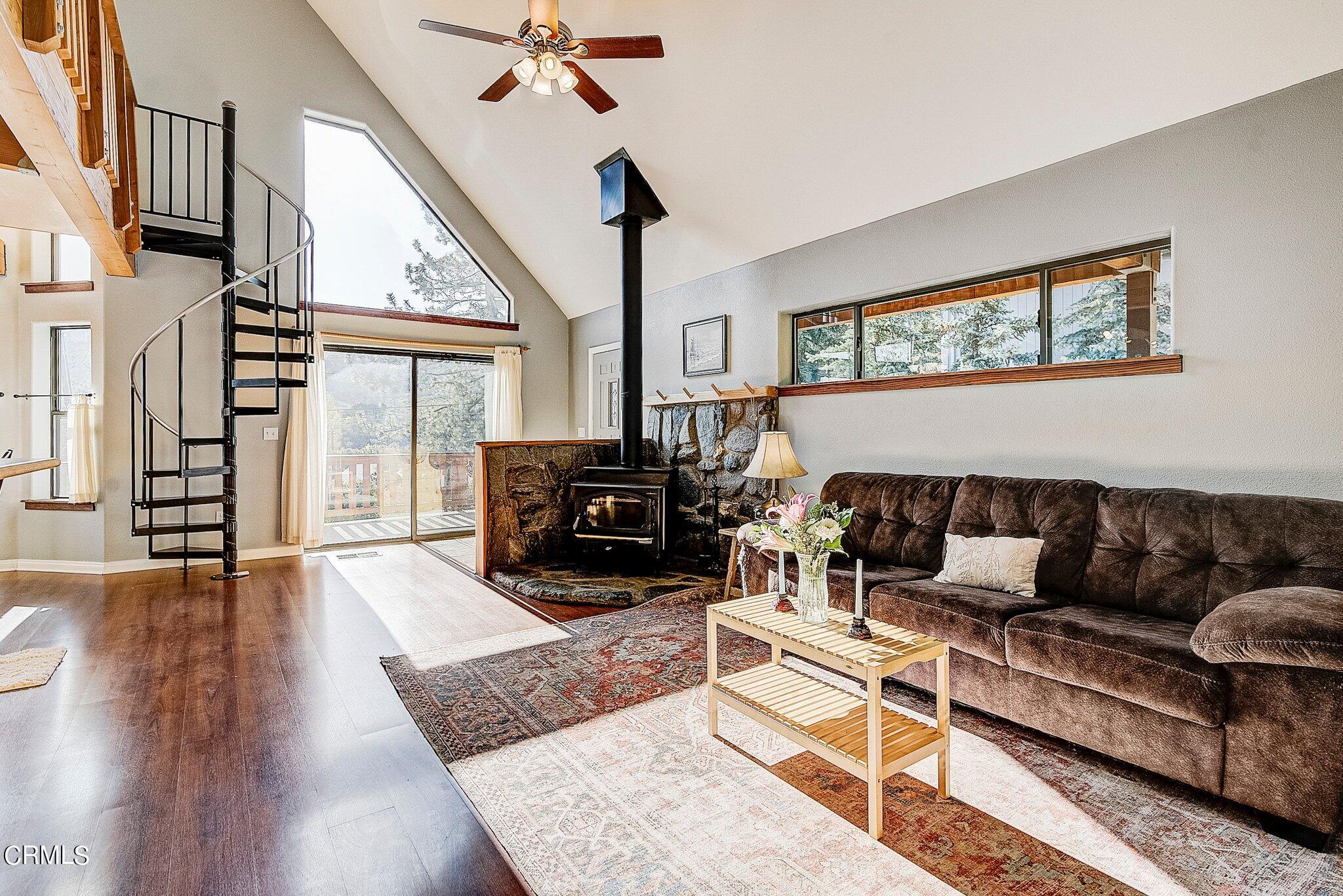 5390 Locarno Drive Wrightwood, CA 92397 - Photo 8 of 33 a living room with furniture and a large window