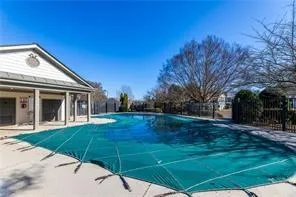 a view of an house with backyard space and garden