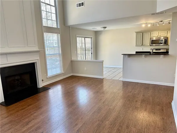 a view of kitchen with furniture and fireplace