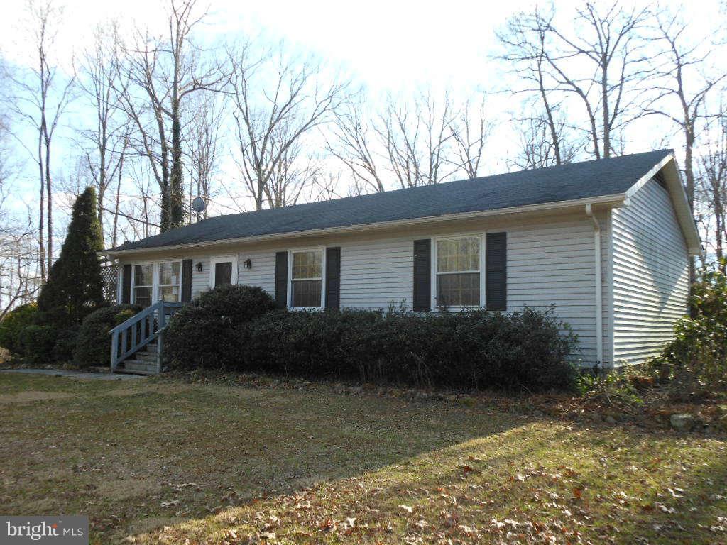 15140 Sheads Mountain Road Rixeyville, VA 22737 - Photo 1 of 12 a view of a house with backyard and garden