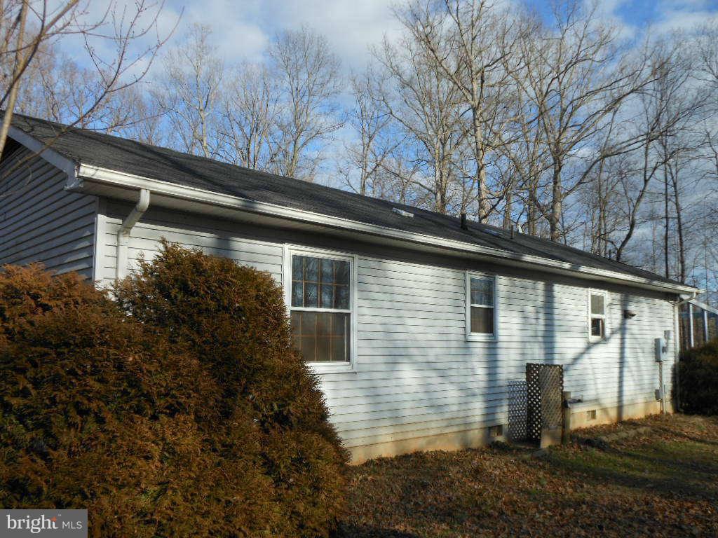 15140 Sheads Mountain Road Rixeyville, VA 22737 - Photo 3 of 12 a backyard of a house