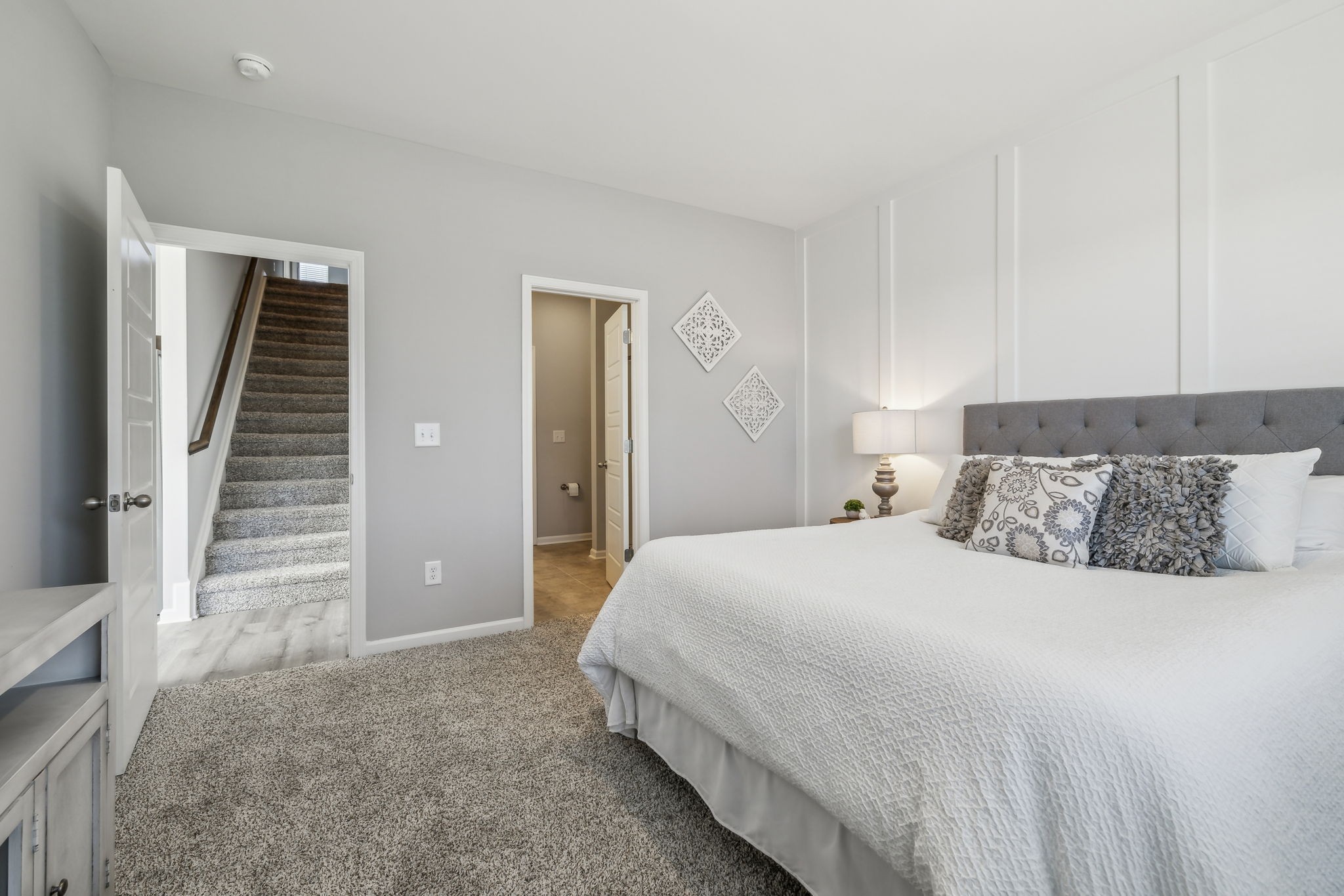 326 Carver Connection Lebanon, TN 37087 - Photo 14 of 30 a bedroom with a bed and a large mirror