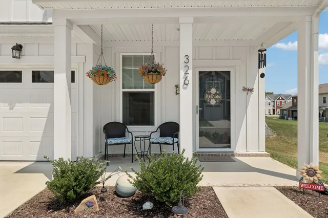 a front view of a house with patio