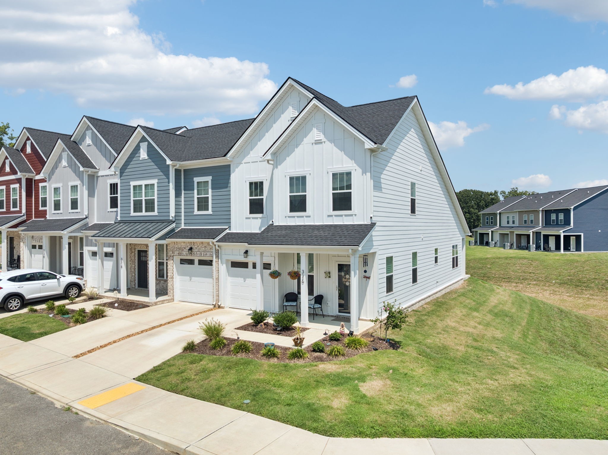 326 Carver Connection Lebanon, TN 37087 - Photo 28 of 30 a view of a white house with a small yard and large trees
