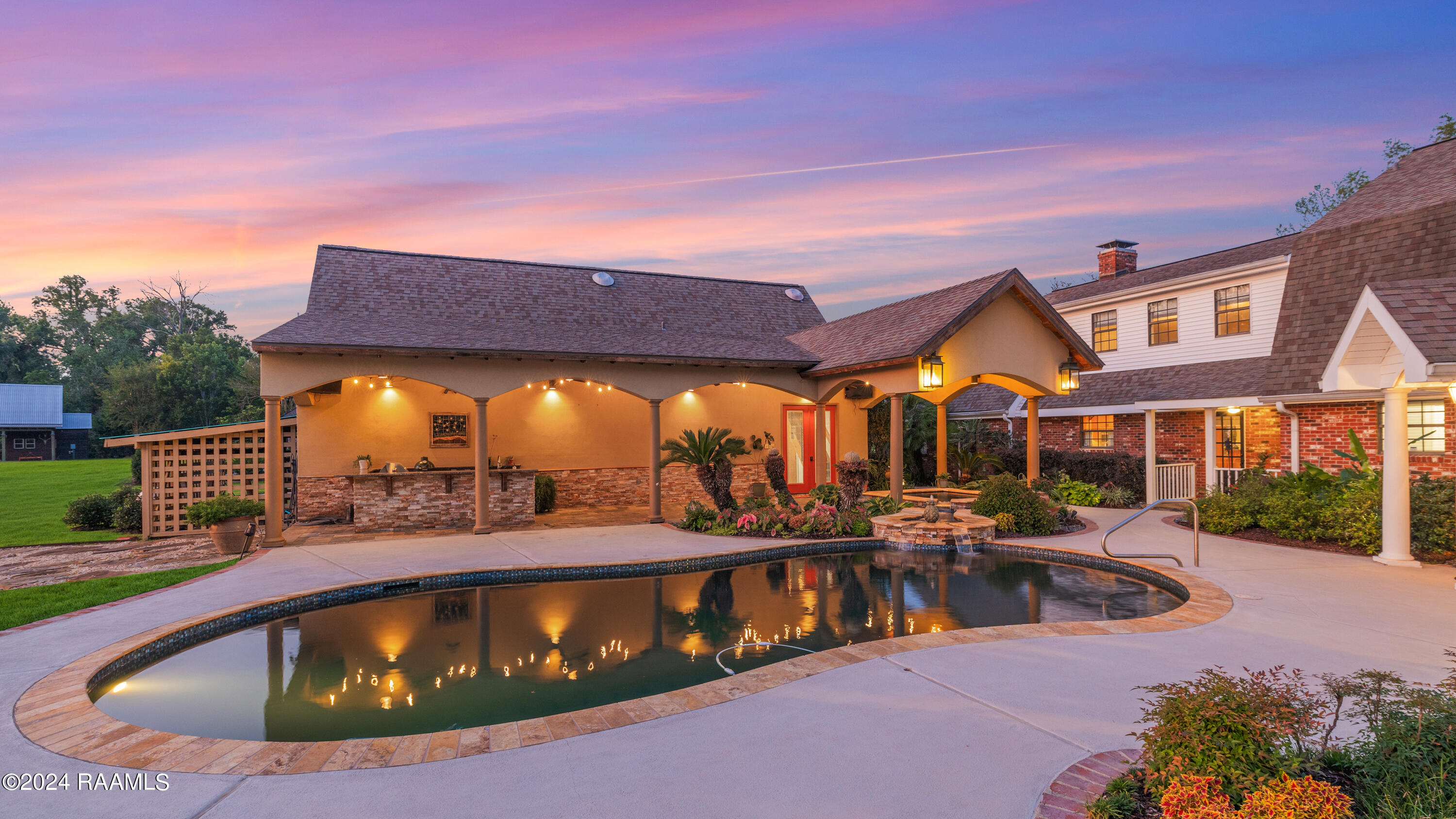 120 Kimball Drive Lafayette, LA 70508 - Photo 45 of 51 Pool and Home Twilight