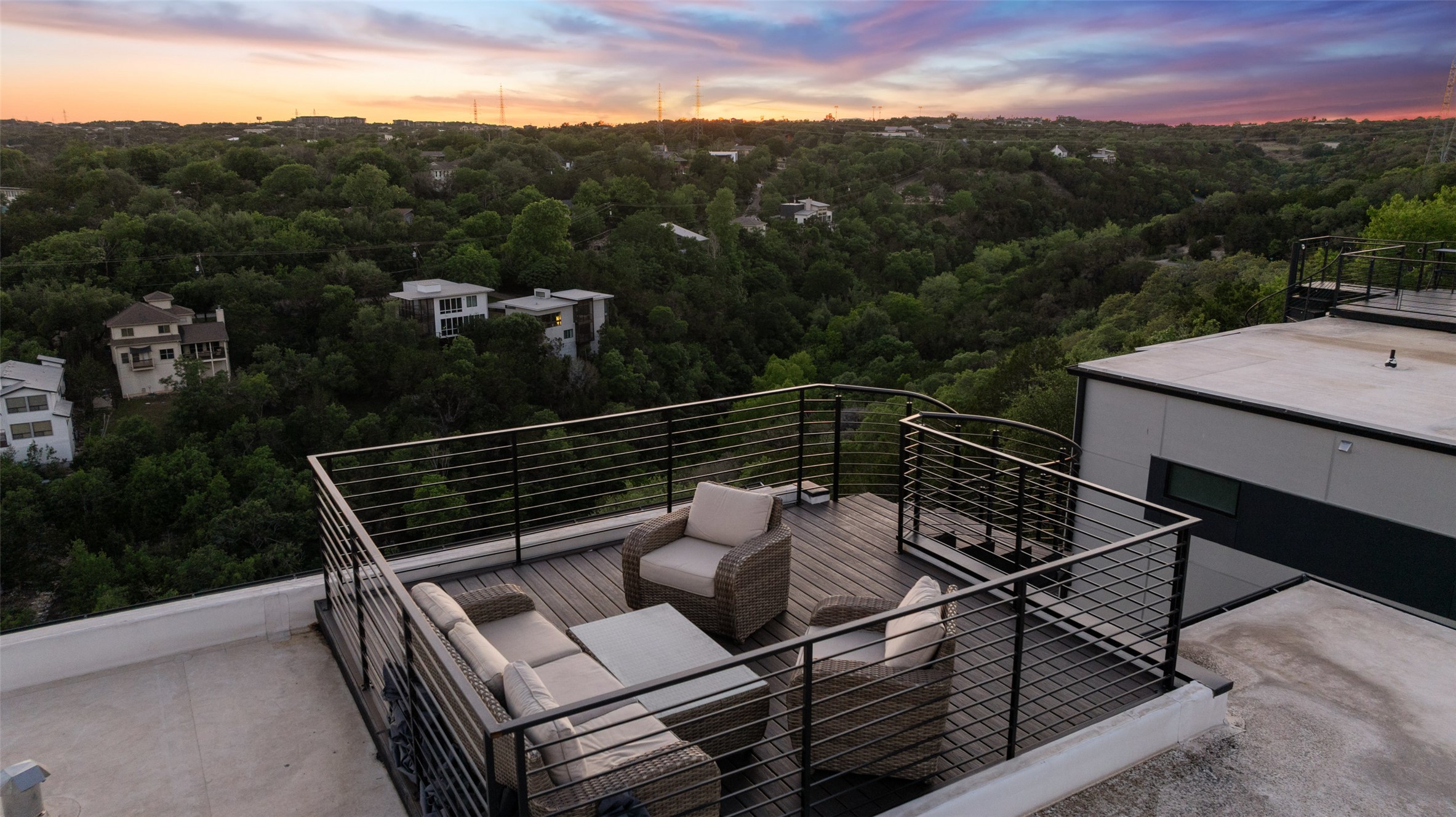 14417 Cochise Trail Austin, TX 78734 - Photo 13 of 40 a view of a roof deck with couches and sky view