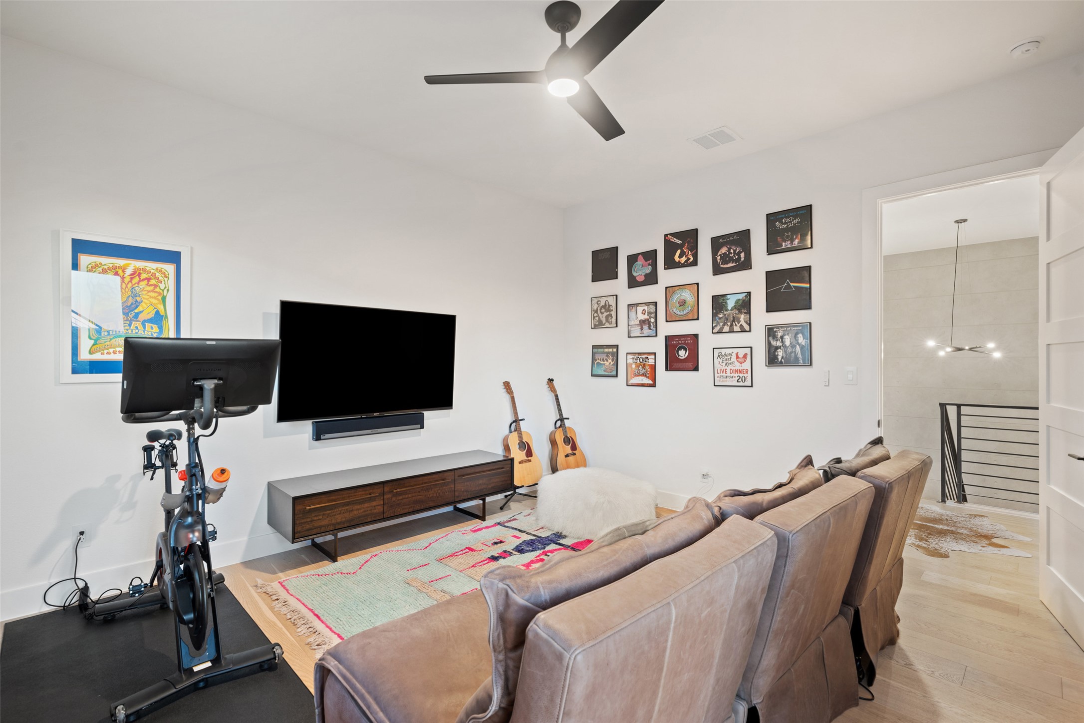 14417 Cochise Trail Austin, TX 78734 - Photo 17 of 40 a bedroom with a bed and a flat screen tv