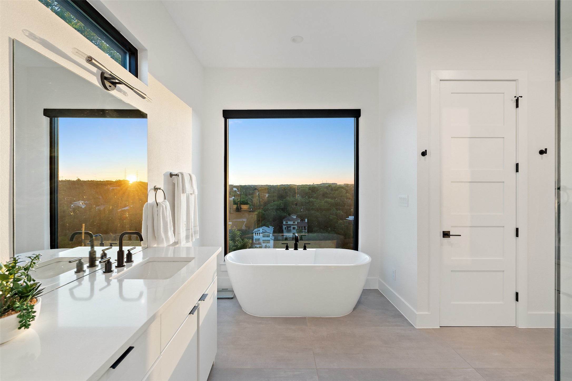 14417 Cochise Trail Austin, TX 78734 - Photo 21 of 40 a bathroom with a sink a mirror and a bathtub