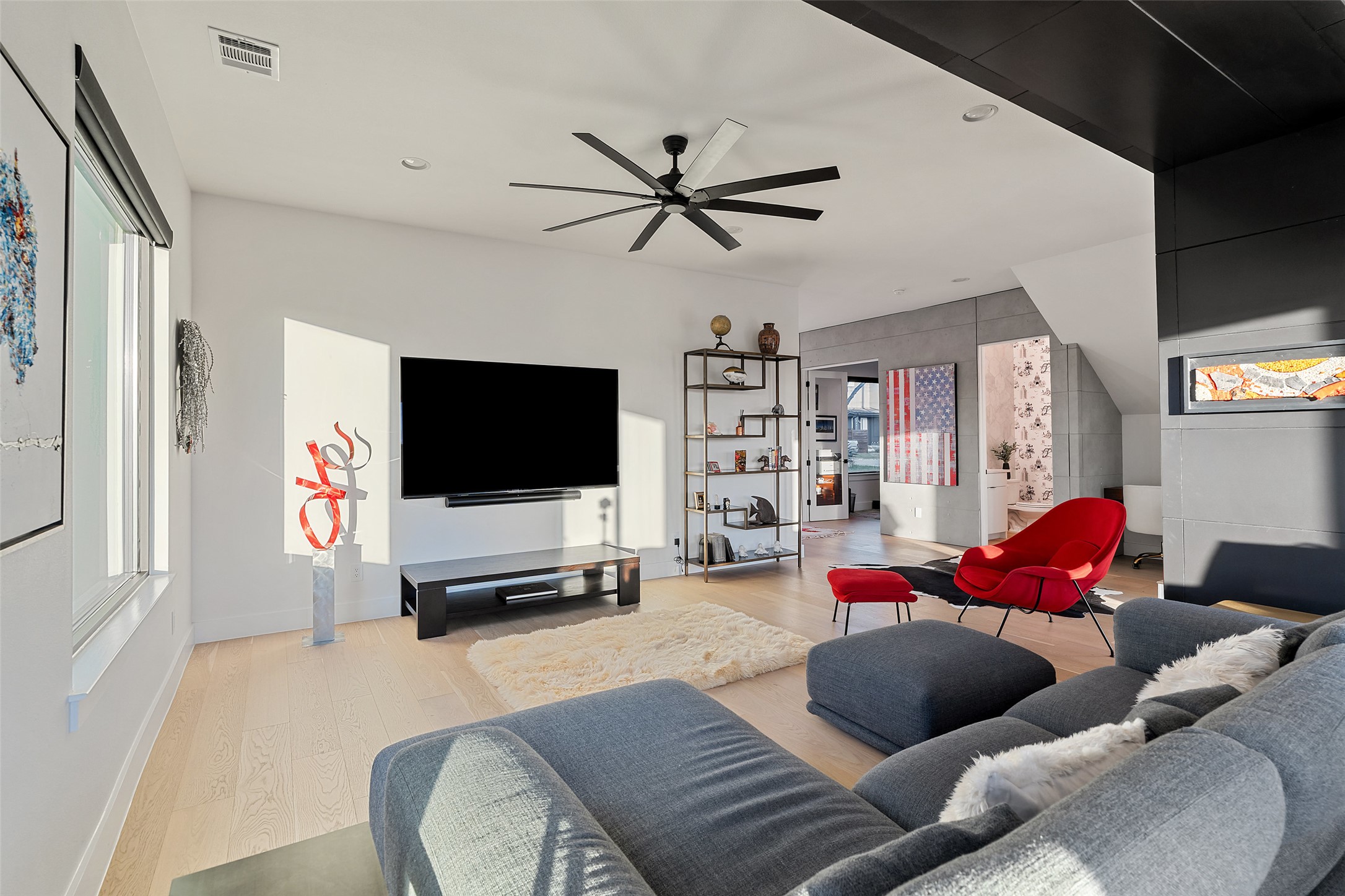 14417 Cochise Trail Austin, TX 78734 - Photo 29 of 40 a living room with furniture and a flat screen tv