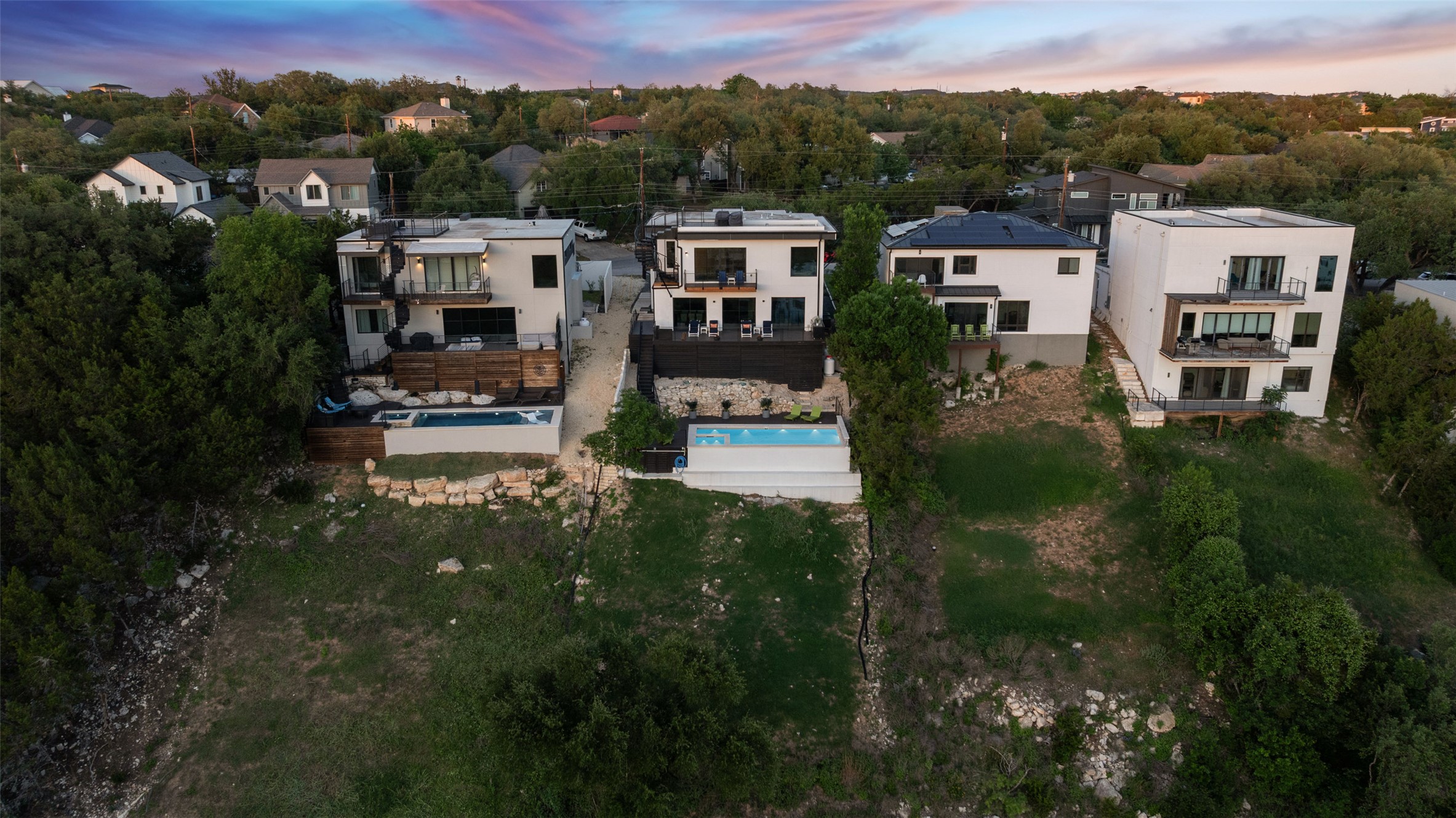 14417 Cochise Trail Austin, TX 78734 - Photo 30 of 40 an aerial view of residential houses with outdoor space and trees