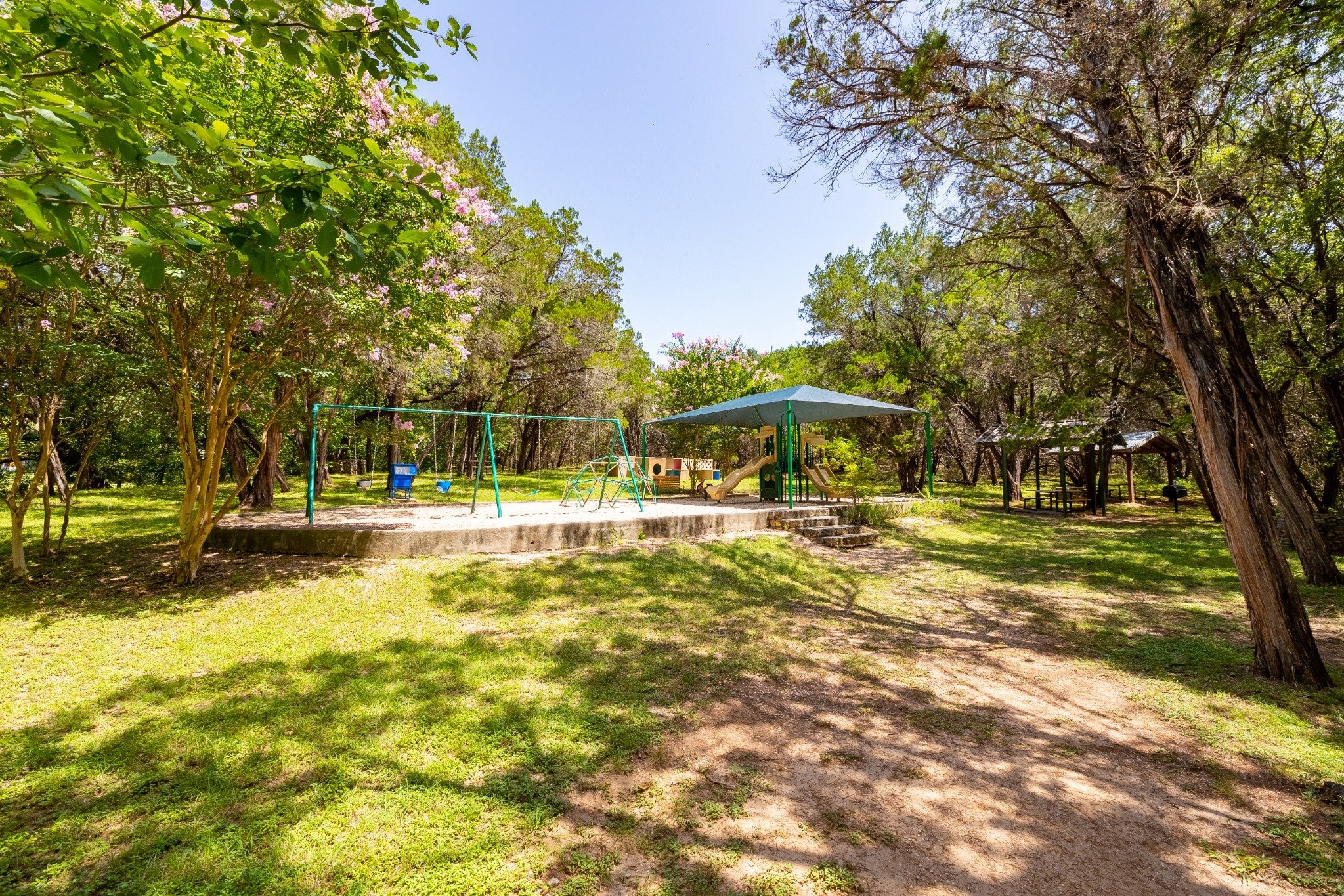 14417 Cochise Trail Austin, TX 78734 - Photo 37 of 40 a view of yard with swimming pool and trees