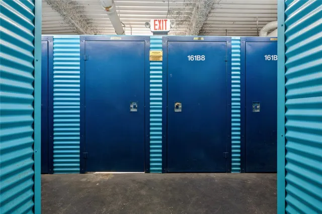 a swimming pool with outdoor seating and yard