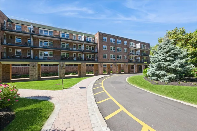 a view of a street with a bench