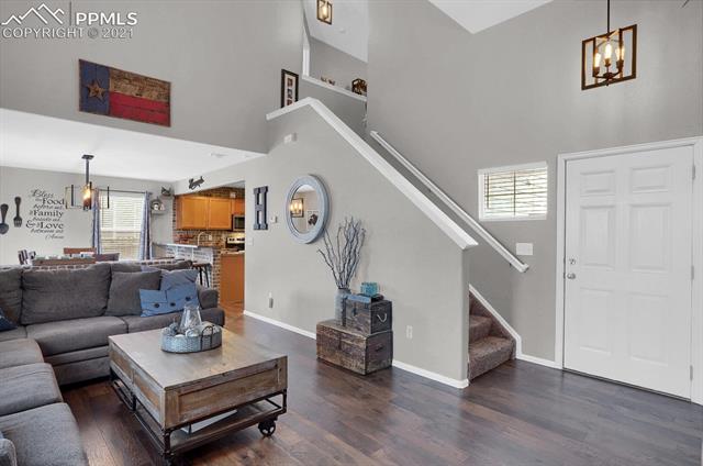 5215 Gentle Wind Road Colorado Springs, CO 80922 - Photo 13 of 43 Modern colors and updated light fixtures.