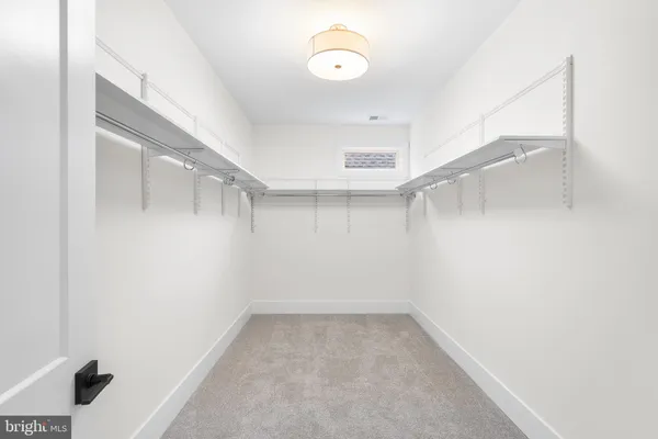 a view of a room with racks on the wall