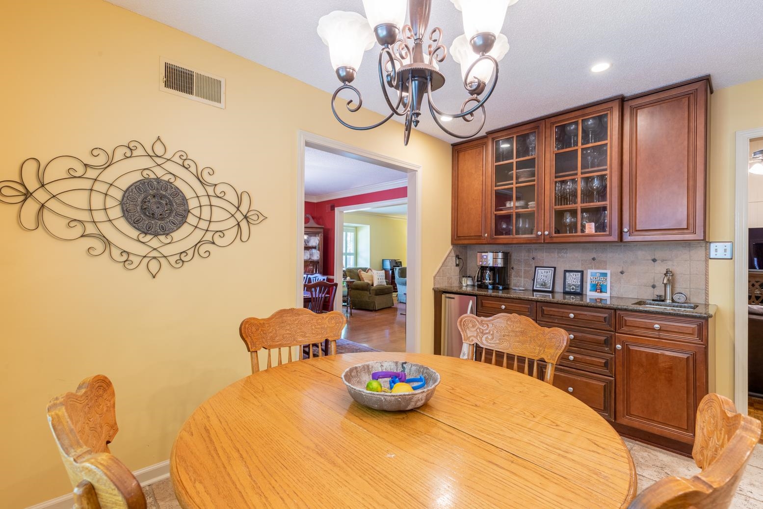 7140 River Reach Road Germantown, TN 38138 - Photo 11 of 25 a kitchen with a table and chairs in it