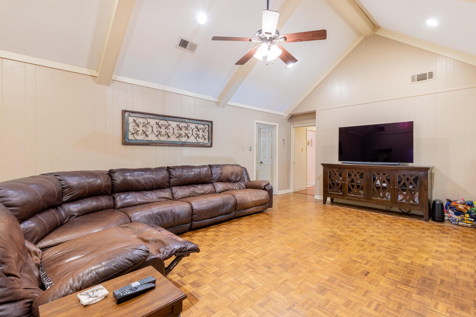 7140 River Reach Road Germantown, TN 38138 - Photo 13 of 25 a living room with furniture and a flat screen tv