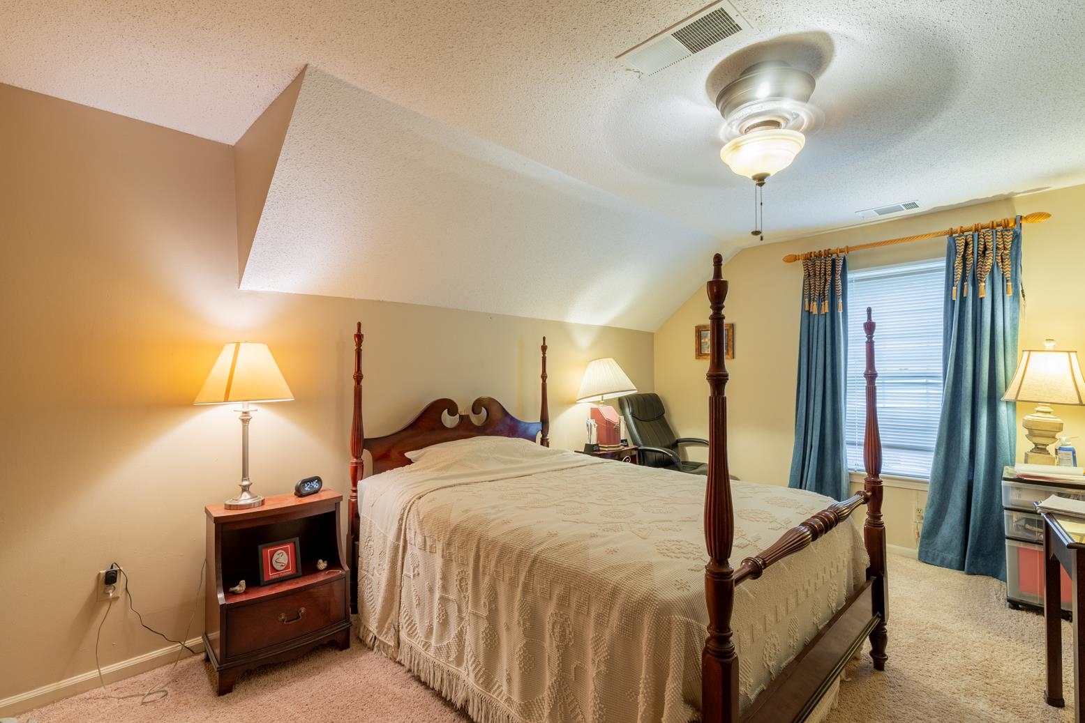 7140 River Reach Road Germantown, TN 38138 - Photo 20 of 25 a bed room with a bed and a lamp