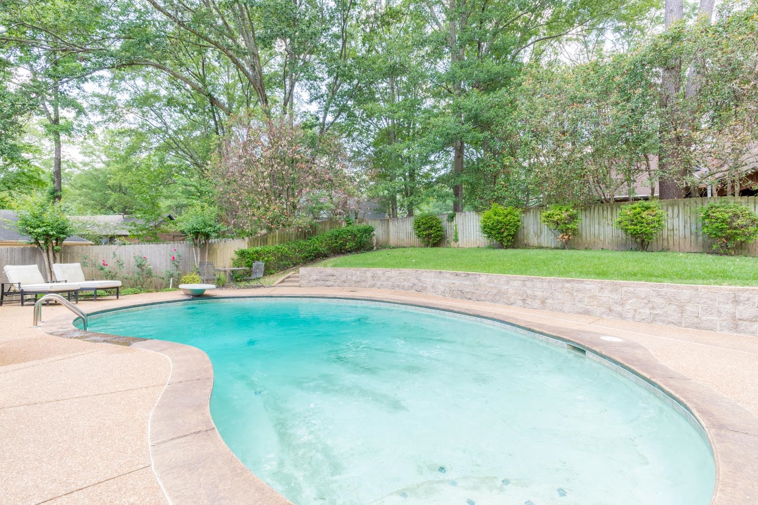 7140 River Reach Road Germantown, TN 38138 - Photo 24 of 25 a view of a backyard with swimming pool