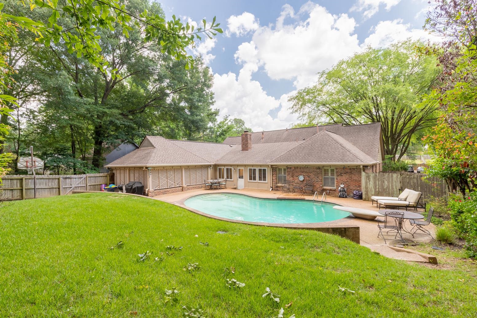 7140 River Reach Road Germantown, TN 38138 - Photo 25 of 25 a view of a house with a yard porch and sitting area