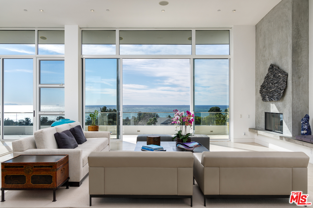 27454 Winding Way Malibu, CA 90265 - Photo 6 of 38 a living room with furniture and a large window