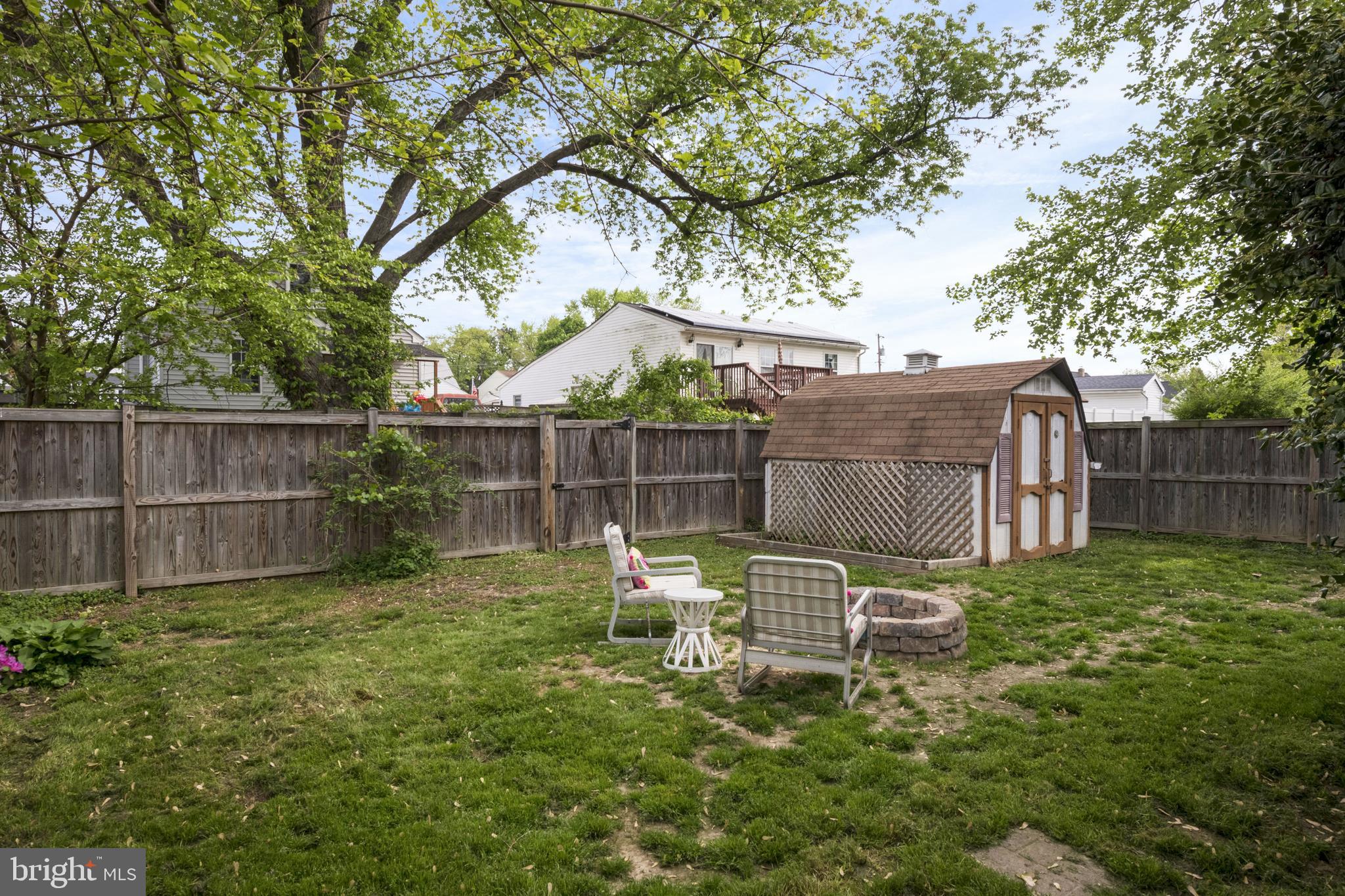 418 Cresswell Road Baltimore, MD 21225 - Photo 37 of 41 Fire pit and fenced yard means s'mores stay yours!