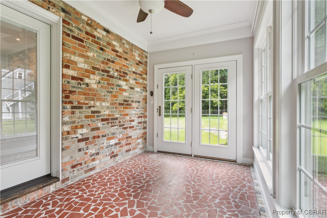9300 Marlfield Road Gloucester, VA 23061 - Photo 16 of 50 Unfurnished sunroom with ceiling fan