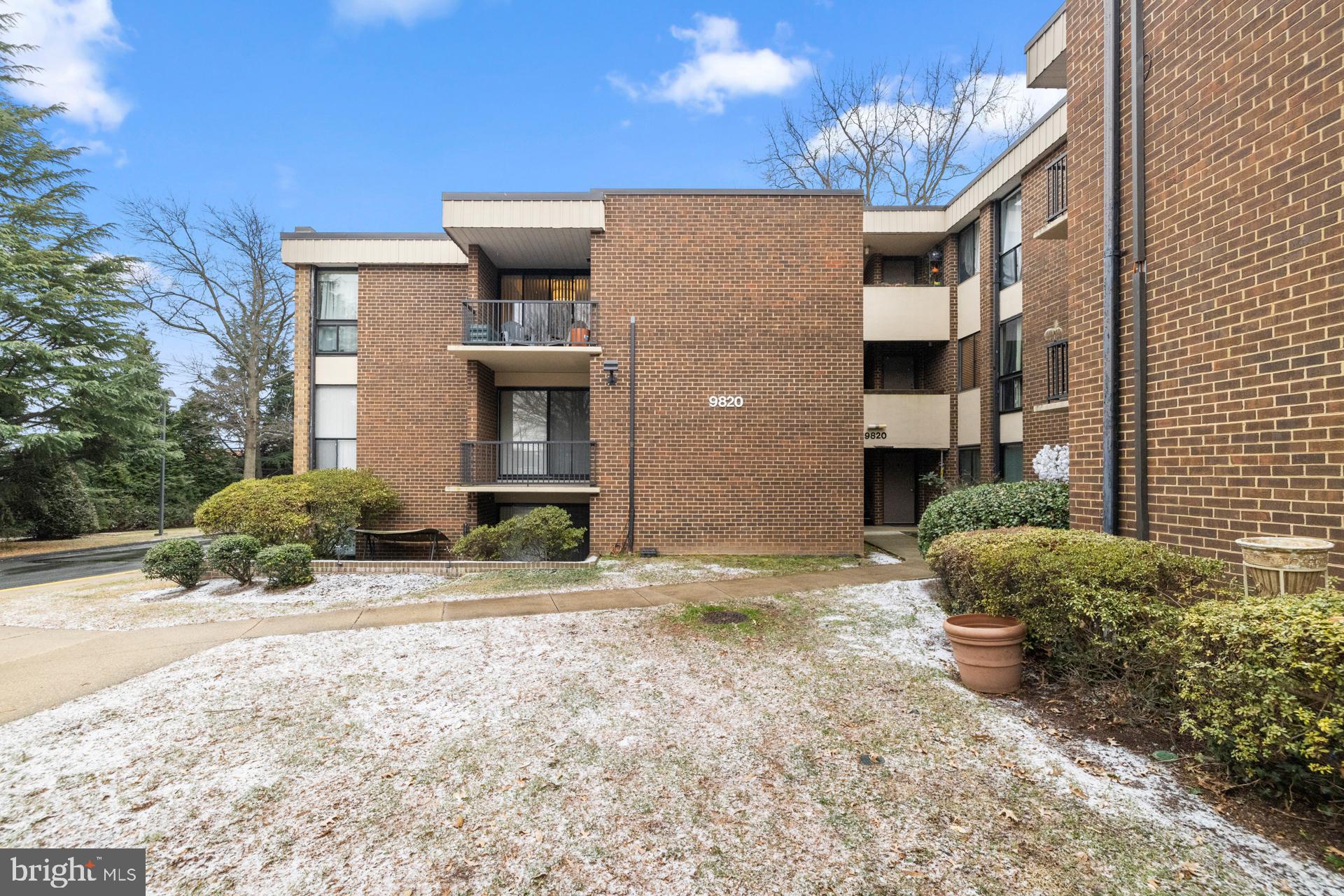 Charming brick apartment in serene setting.