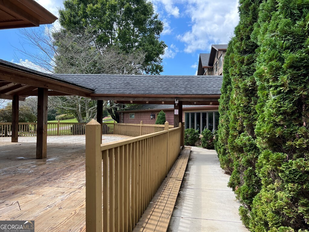 Lot 73 M Ridges Hayesville, NC 28904 - Photo 23 of 45 an outdoor view of house with deck and outdoor seating