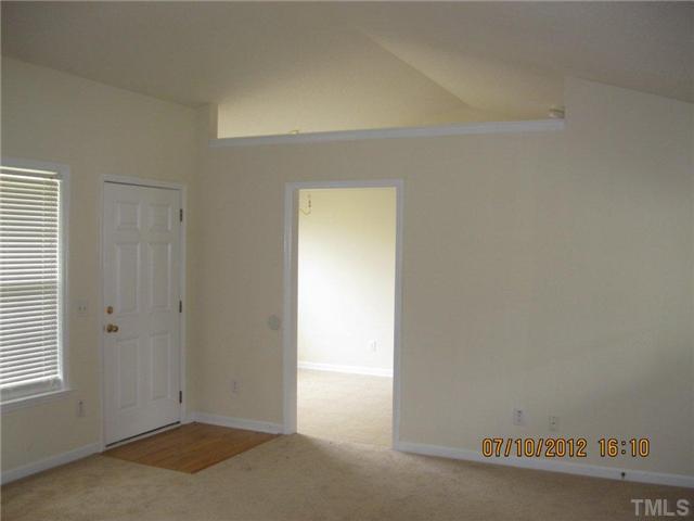 4321 Moss Spring Drive Raleigh, NC 27616 - Photo 7 of 7 an empty room with windows