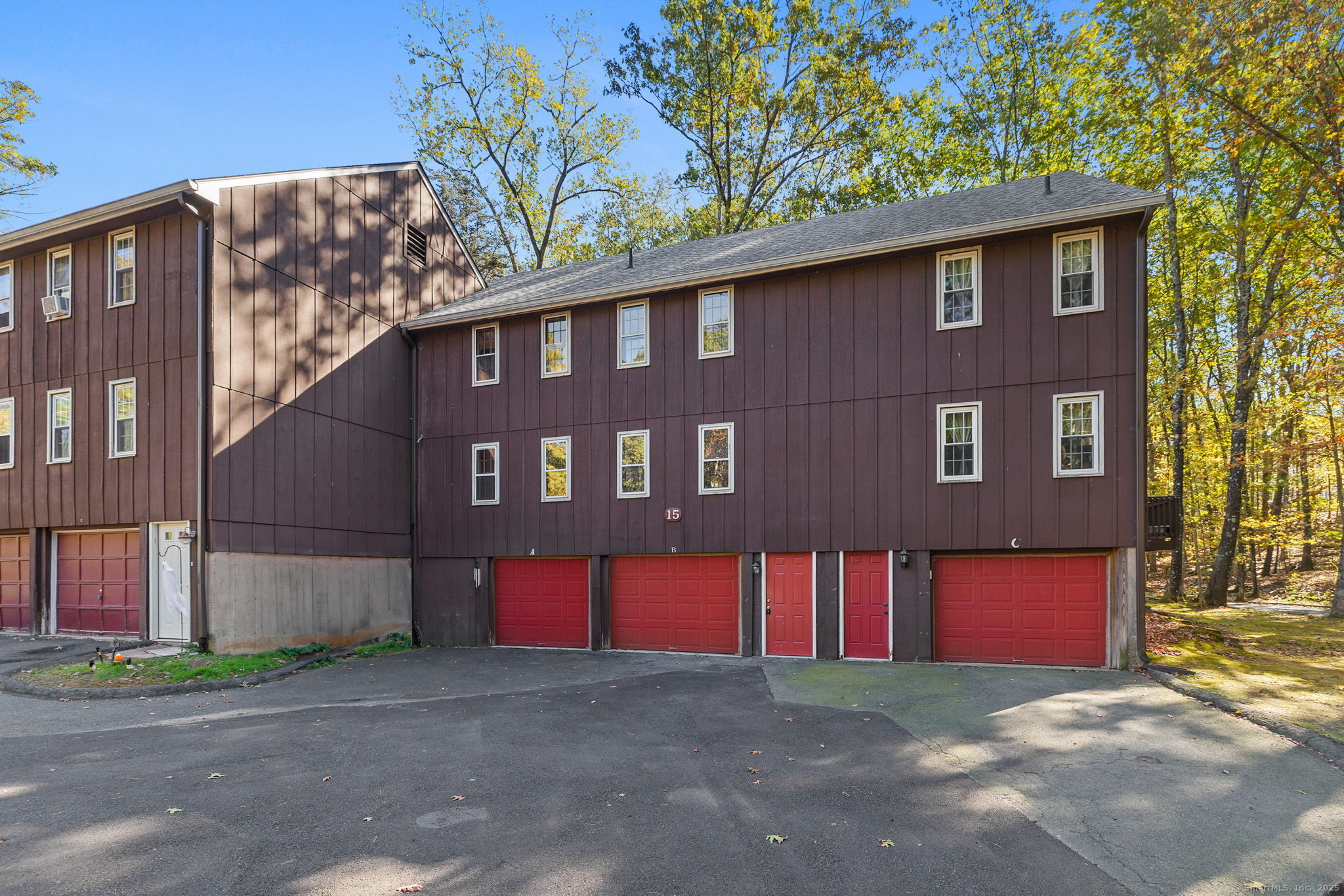 a front view of building with yard