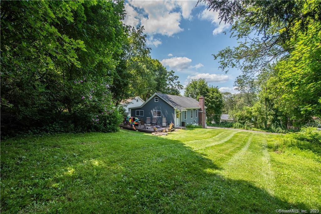 32 Lakeview Drive Bethlehem, CT 06751 - Photo 12 of 12 a front view of a house with a garden