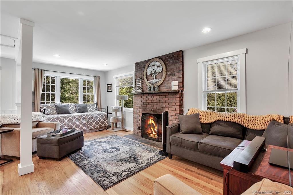 32 Lakeview Drive Bethlehem, CT 06751 - Photo 4 of 12 a living room with furniture and a fireplace