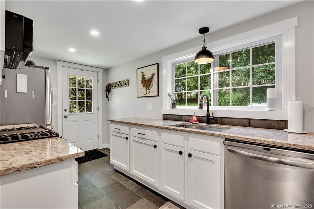 32 Lakeview Drive Bethlehem, CT 06751 - Photo 6 of 12 a kitchen with granite countertop a stove and a sink