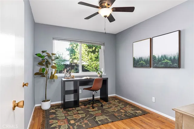 a workspace with furniture and window